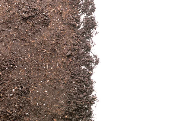 Brown soil on white background — Stock Photo, Image