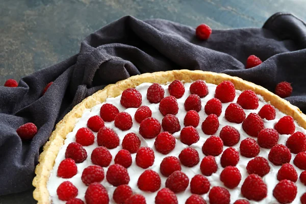 Tasty raspberry pie on table, closeup