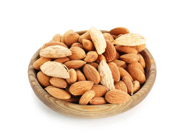 Plate with tasty almonds on white background — Stock Photo, Image