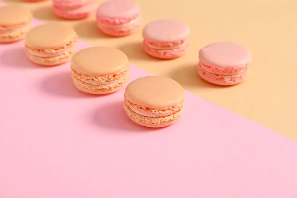 Tasty macarons on color background — Stock Photo, Image