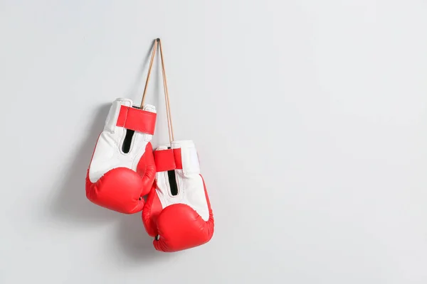 Boxing gloves on light background — Stock Photo, Image