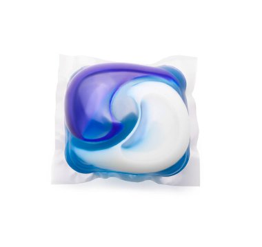 Renk arkaplanında çamaşır deterjanı olan kapsül