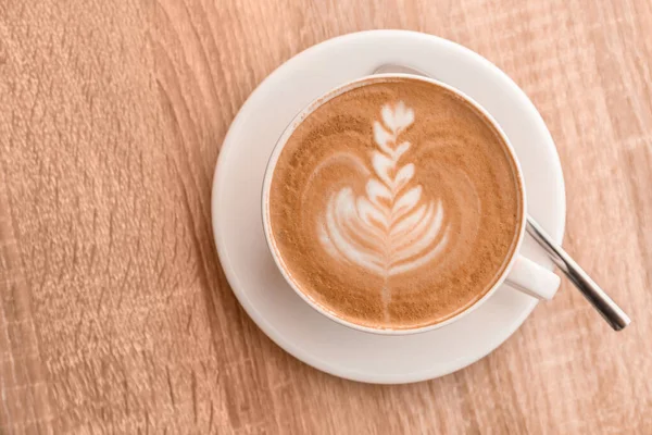 Tasse Leckeren Kaffee Auf Holztisch — Stockfoto