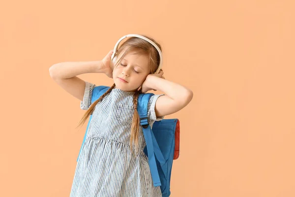 Cute Little Schoolgirl Listening Music Color Background — Stock Photo, Image