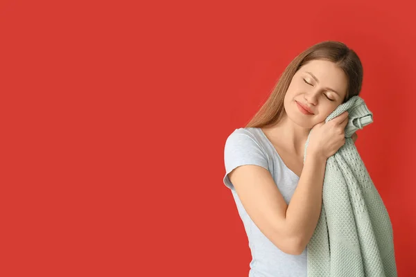 Young Woman Clean Laundry Color Background — Stock Photo, Image