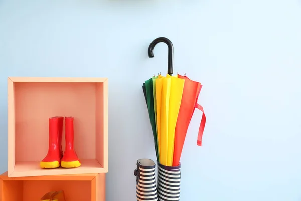 Stylish Umbrella Gumboots Color Wall — Stock Photo, Image