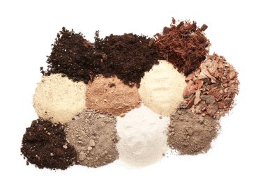 Beyaz arkaplanda farklı toprak yığınları