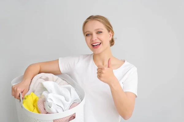 Young Woman Laundry Showing Thumb Gesture Grey Background — Stock Photo, Image