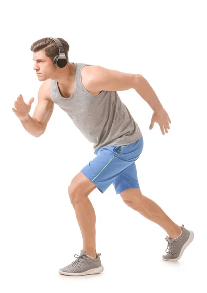 Deportivo Corriendo Joven Sobre Fondo Blanco —  Fotos de Stock