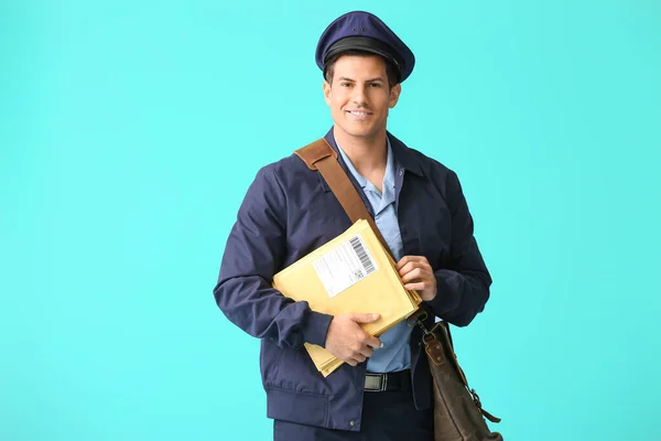 Handsome Young Postman Color Background — Stock Photo, Image