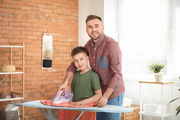 Man His Little Son Ironing Laundry Home — Stock Photo, Image