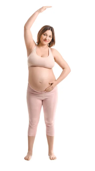 Mujer Embarazada Joven Practicando Yoga Sobre Fondo Blanco — Foto de Stock