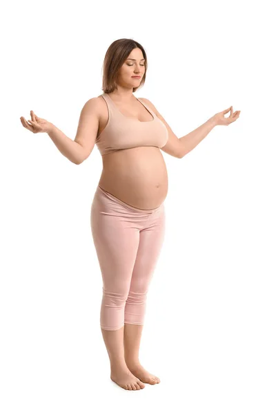 Genç Hamile Kadın Beyaz Arka Planda Yoga Yapıyor — Stok fotoğraf