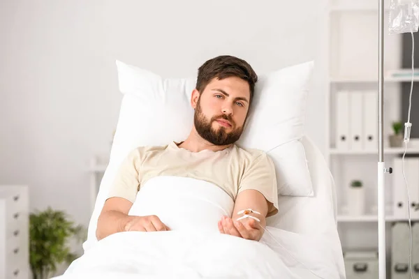 Young man in hospital room