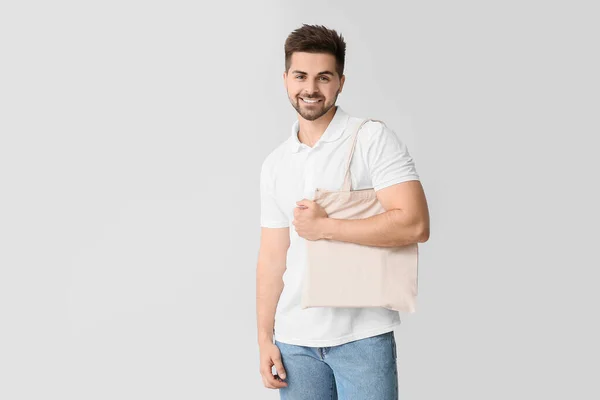 Young Man Eco Bag Light Background — Stock Photo, Image