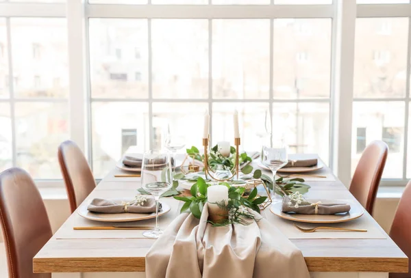 Beautiful table setting in dining room