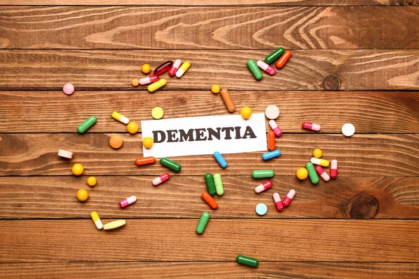 Word Dementia Pills Wooden Background — Stock Photo, Image