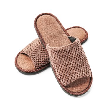 Beyaz arka planda bir çift yumuşak terlik