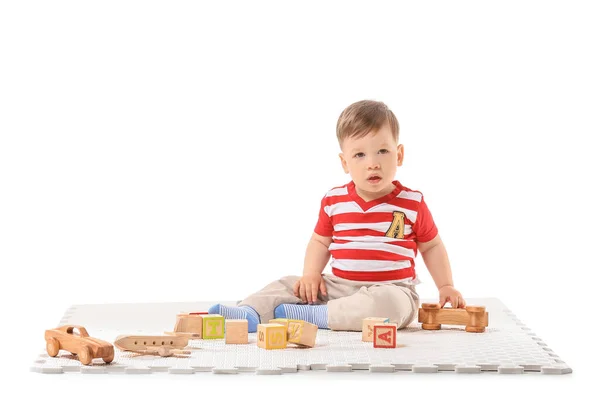 Schattig Jongetje Met Speelgoed Witte Achtergrond — Stockfoto