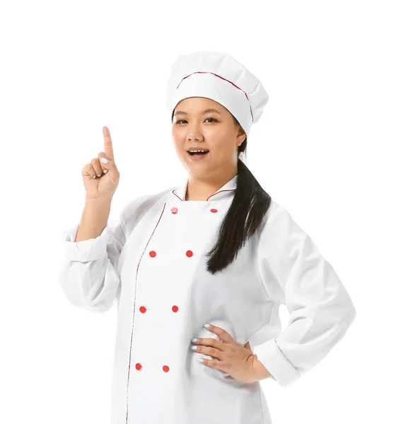 白い背景に人差し指を上げた美しいアジア料理人 — ストック写真