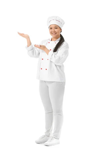Belo Chef Asiático Mostrando Algo Fundo Branco — Fotografia de Stock