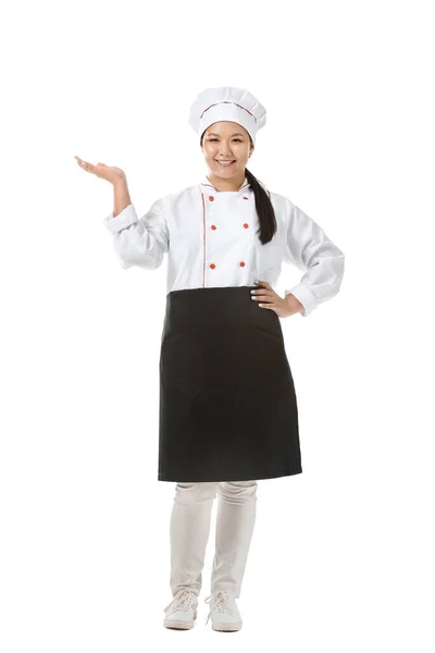 Belo Chef Asiático Mostrando Algo Fundo Branco — Fotografia de Stock