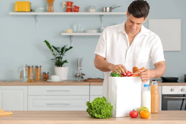 Man Unpacking Fresh Products Market Kitchen — Stock Photo, Image