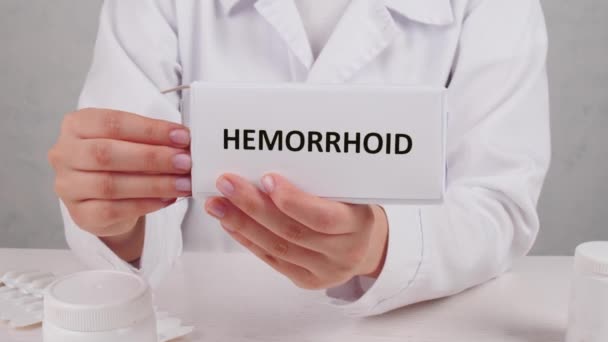 Proctologist Pack Hemorrhoidal Suppositories Closeup — Stock Video