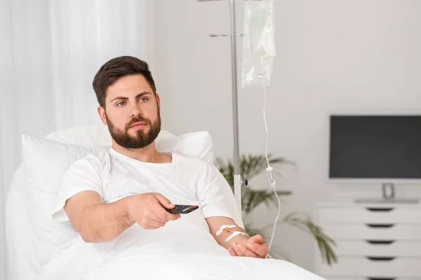 Young man in hospital room