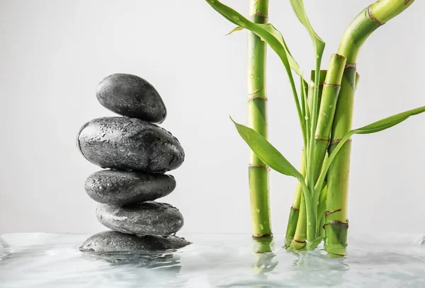 Stack Spa Stones Bamboo Water Light Background — Stock Photo, Image