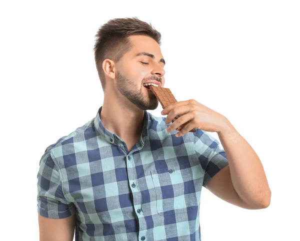 Joven Guapo Con Sabroso Chocolate Sobre Fondo Blanco — Foto de Stock