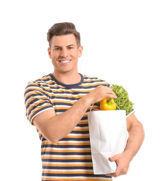 Joven Hombre Sosteniendo Bolsa Con Comida Sobre Fondo Blanco —  Fotos de Stock