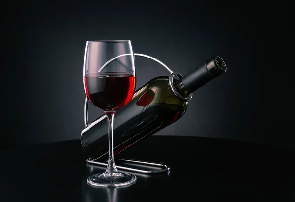 Holder with bottle and glass of wine on dark background