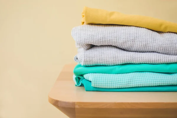 Stack Clean Clothes Stool Color Background Closeup — Stock Photo, Image