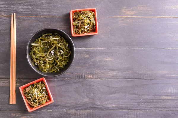 Bowls Tasty Seaweed Chopsticks Table — Stock Photo, Image
