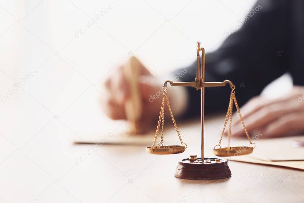 Scales of justice at workplace of notary public