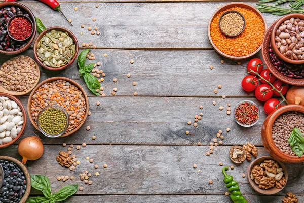 Different Raw Legumes Spices Table — Stock Photo, Image