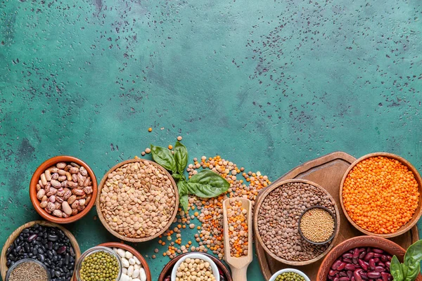 Different Raw Legumes Spices Color Background — Stock Photo, Image