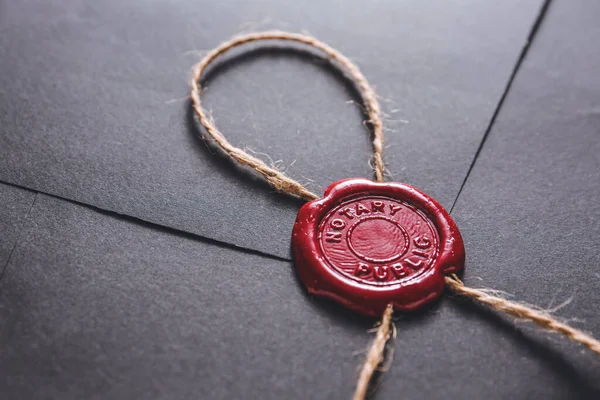 Envelope with notary public wax seal, closeup