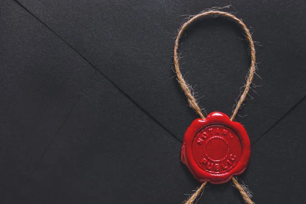 Envelope with notary public wax seal, closeup