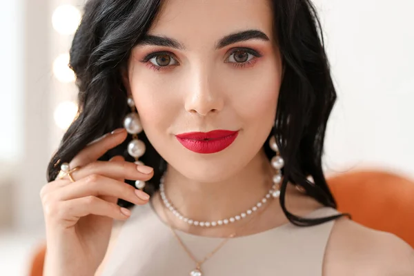 Beautiful Young Woman Wearing Stylish Jewelry Indoors — Stock Photo, Image