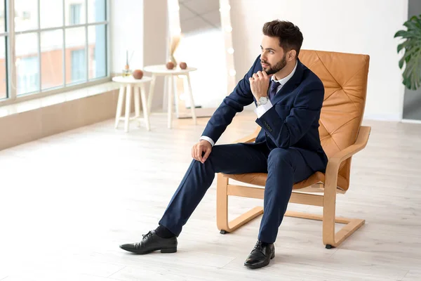Stylish Young Man Sitting Armchair Indoors — Stock Photo, Image