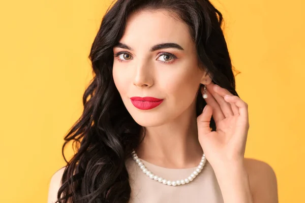 Beautiful Young Woman Wearing Stylish Jewelry Color Background — Stock Photo, Image