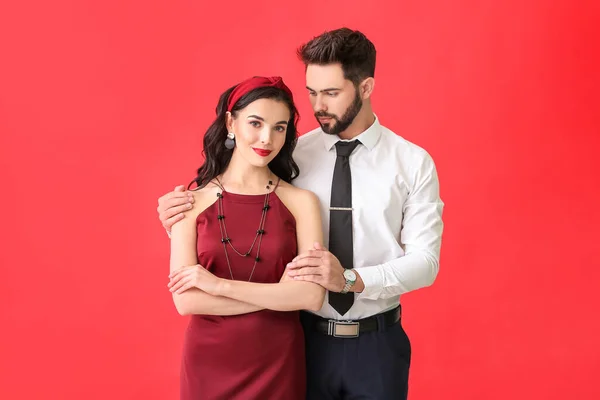 Young Couple Wearing Stylish Accessories Color Background — Stock Photo, Image