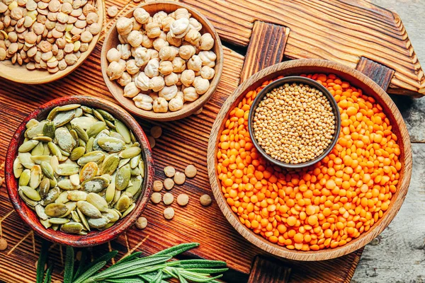 Different Raw Legumes Spices Table — Stock Photo, Image