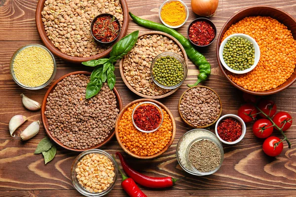 Different Raw Legumes Spices Table — Stock Photo, Image