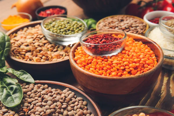 Different Raw Lentils Spices Table — Stock Photo, Image
