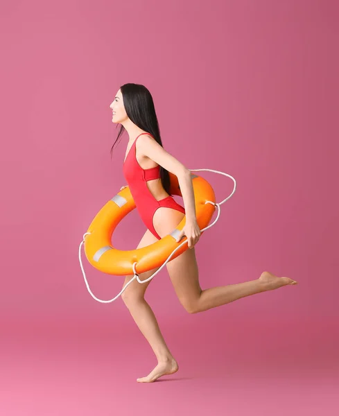 Running Beach Rescuer Lifebuoy Color Background — Stock Photo, Image
