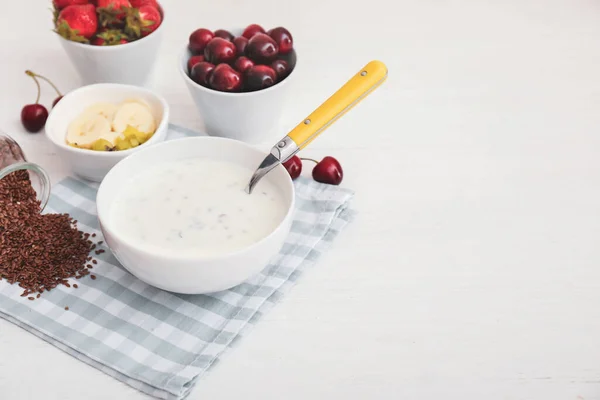 Bowl Yogurt Fruits Flax Seeds White Table — Stock Photo, Image