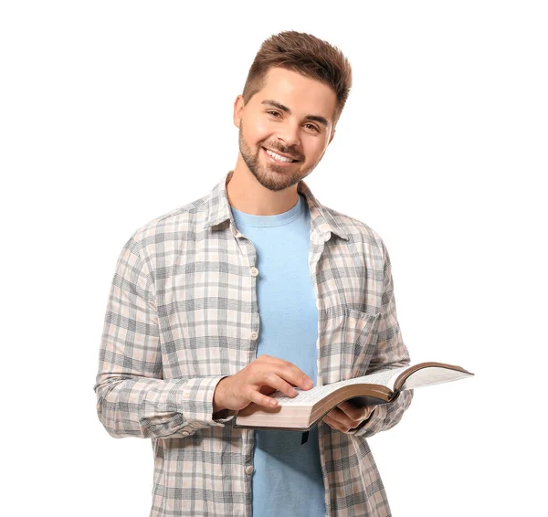 Junger Mann Liest Bibel Auf Weißem Hintergrund — Stockfoto